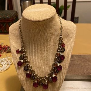 Bronze colored choker with purple stones